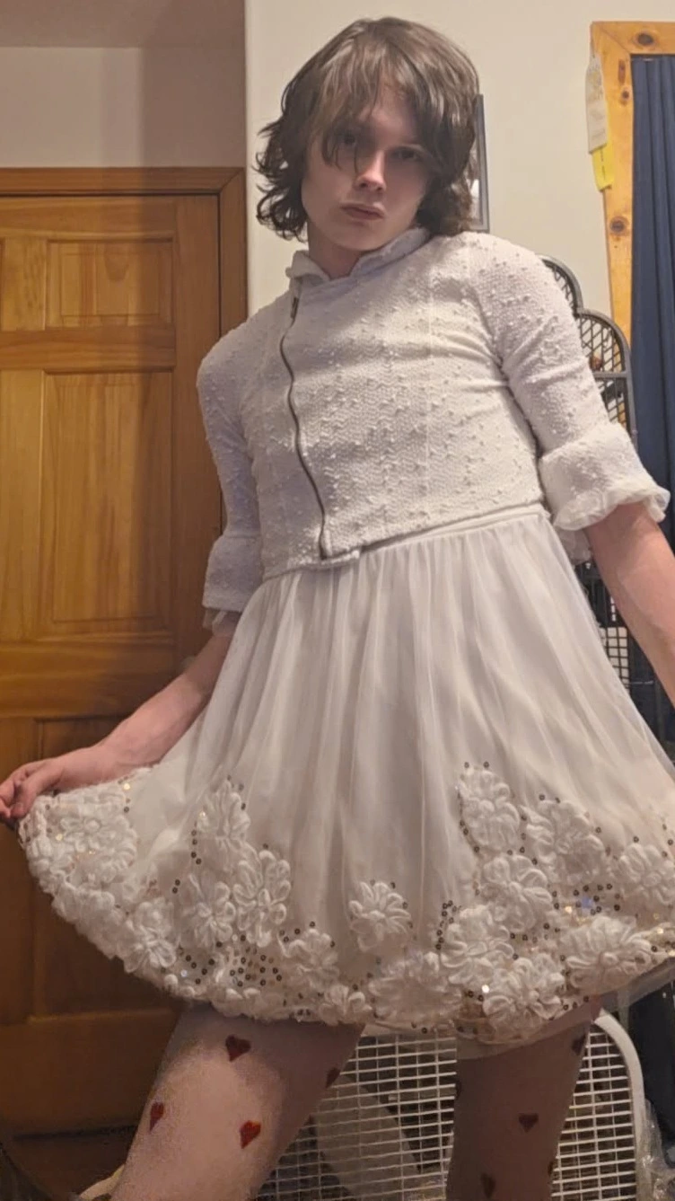 A cute white dress with flowery lace